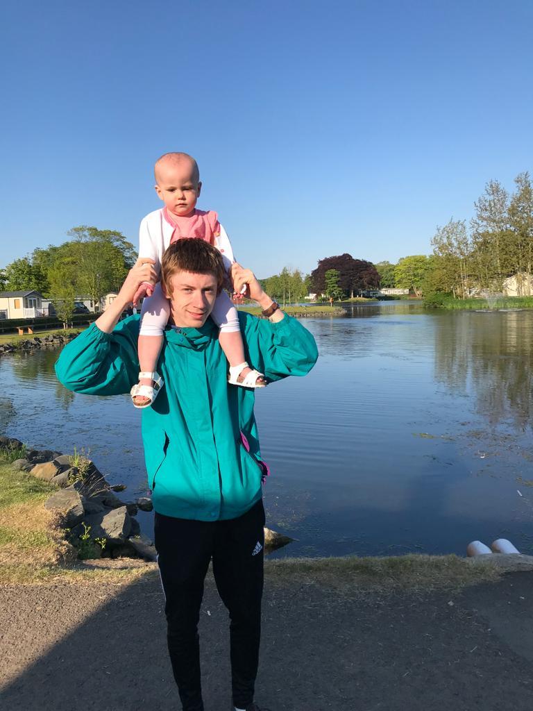 Baby on dads shoulders